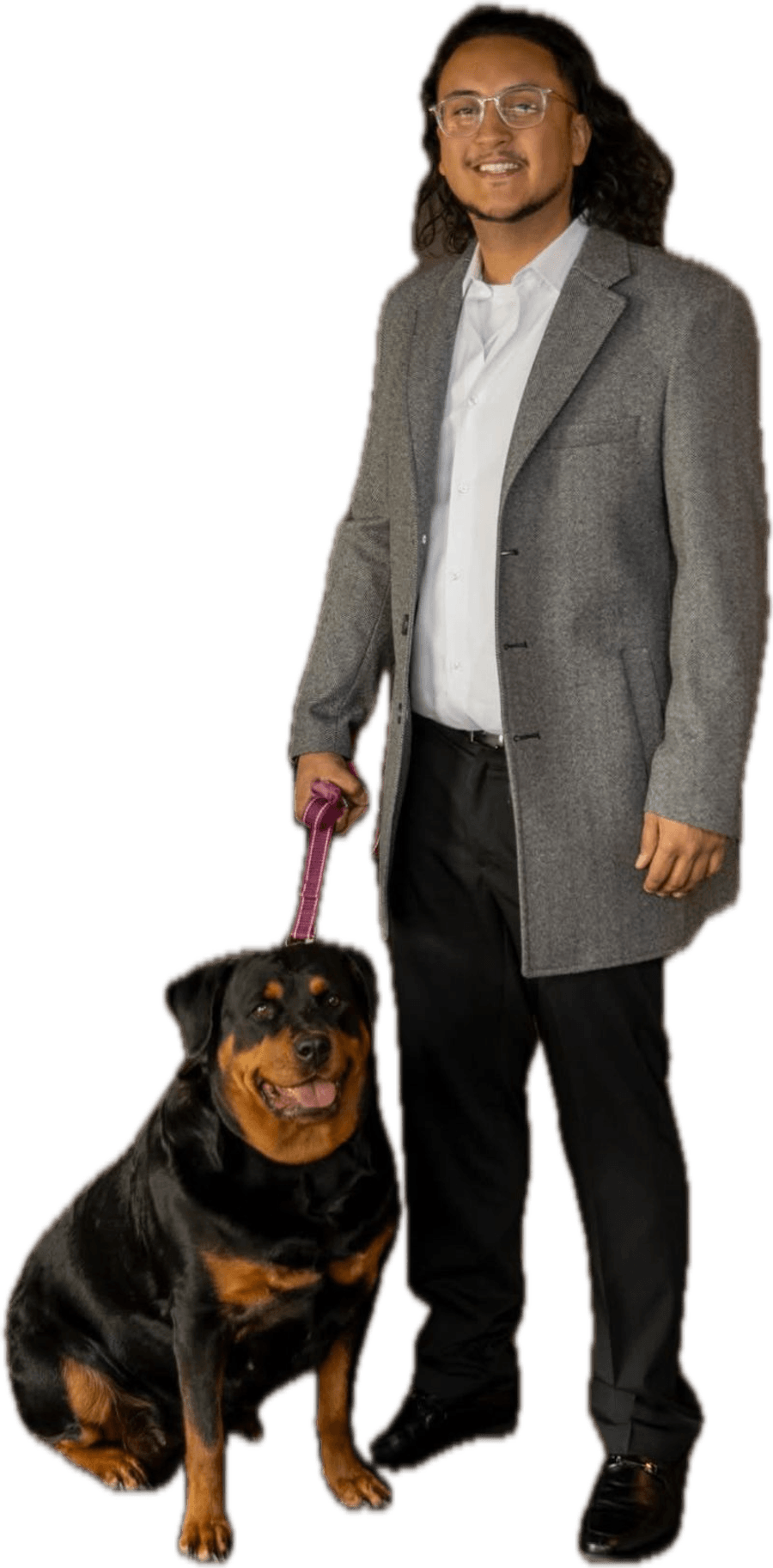 Daniel Vera, founder of DVera Solutions, with his Rottweiler